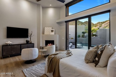 Situated in Desert Highlands coveted Hillside Villas, this