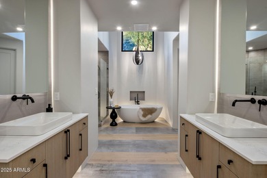 Situated in Desert Highlands coveted Hillside Villas, this