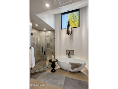 Situated in Desert Highlands coveted Hillside Villas, this