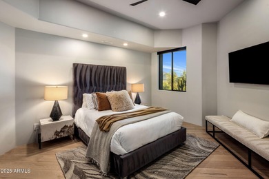 Situated in Desert Highlands coveted Hillside Villas, this