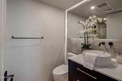 Situated in Desert Highlands coveted Hillside Villas, this