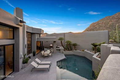 Situated in Desert Highlands coveted Hillside Villas, this