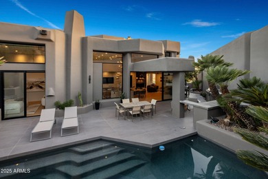 Situated in Desert Highlands coveted Hillside Villas, this