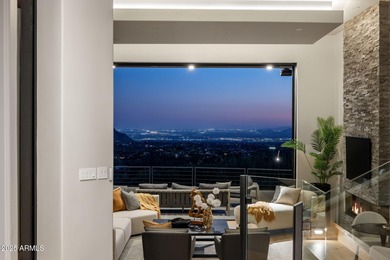 Situated in Desert Highlands coveted Hillside Villas, this