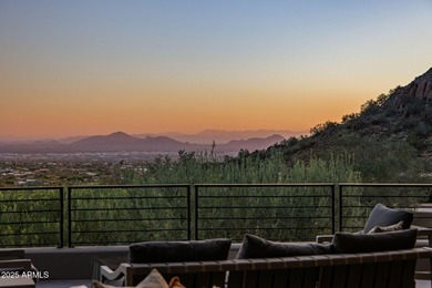 Situated in Desert Highlands coveted Hillside Villas, this