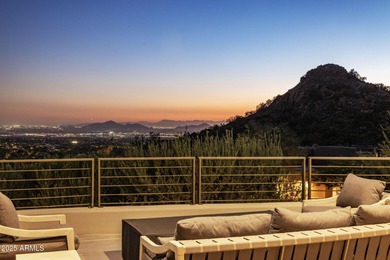 Situated in Desert Highlands coveted Hillside Villas, this