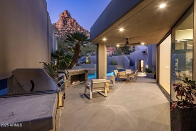 Situated in Desert Highlands coveted Hillside Villas, this