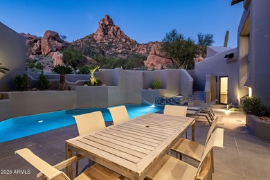 Situated in Desert Highlands coveted Hillside Villas, this