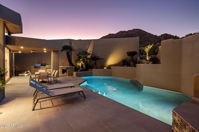 Situated in Desert Highlands coveted Hillside Villas, this