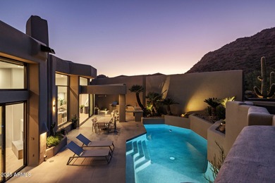 Situated in Desert Highlands coveted Hillside Villas, this