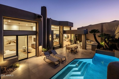 Situated in Desert Highlands coveted Hillside Villas, this