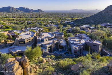 Situated in Desert Highlands coveted Hillside Villas, this