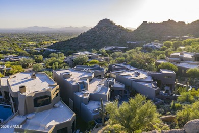 Situated in Desert Highlands coveted Hillside Villas, this