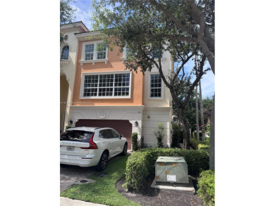 Stunning 3-story corner townhouse with private elevator in