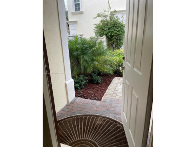 Stunning 3-story corner townhouse with private elevator in