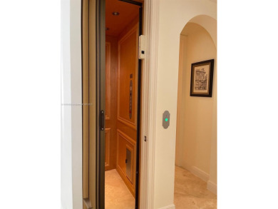 Stunning 3-story corner townhouse with private elevator in