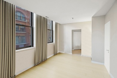 Experience vibrant city living in this spacious corner 2-bedroom