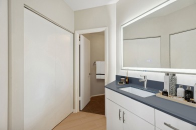 Experience vibrant city living in this spacious corner 2-bedroom