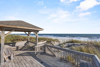 Rhapsody in Blue... Oceanfront Luxury Awaits! This extraordinary