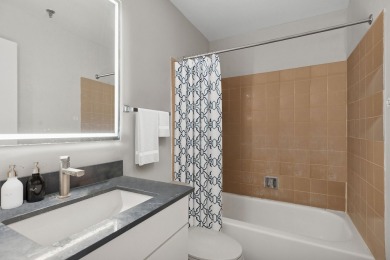 Experience vibrant city living in this spacious corner 2-bedroom