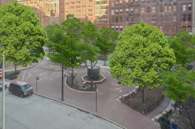 Experience vibrant city living in this spacious corner 2-bedroom