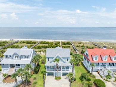 Experience beachfront living like no other at this