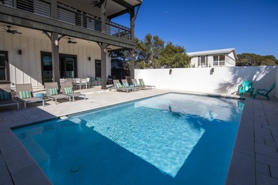 Experience refined coastal living at this exceptional residence