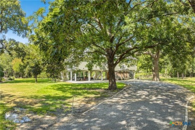 Discover your own private retreat on 10.66 acres bordered by the