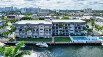 LIVE THE LIFESTYLE IN THIS 2/BED/ 2 BATH CONDO WITH SPLIT FLOOR