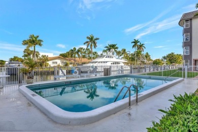 LIVE THE LIFESTYLE IN THIS 2/BED/ 2 BATH CONDO WITH SPLIT FLOOR