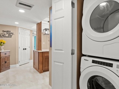 Welcome to your dream oceanfront home, a captivating 2-bedroom