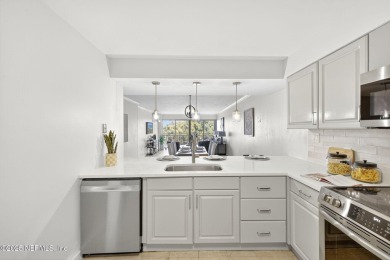 Gated high rise living on the St Johns River! Wake up to