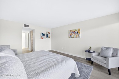 Gated high rise living on the St Johns River! Wake up to