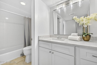 Gated high rise living on the St Johns River! Wake up to