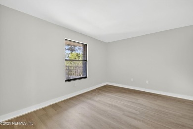 Gated high rise living on the St Johns River! Wake up to