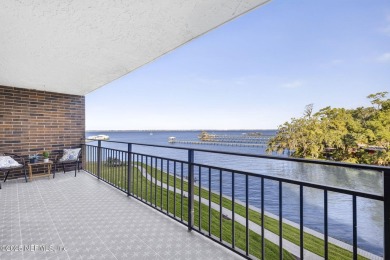 Gated high rise living on the St Johns River! Wake up to