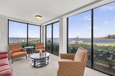 Gated high rise living on the St Johns River! Wake up to