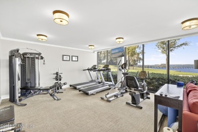 Gated high rise living on the St Johns River! Wake up to