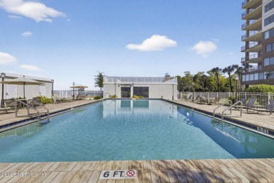 Gated high rise living on the St Johns River! Wake up to