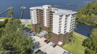 Gated high rise living on the St Johns River! Wake up to