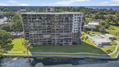 Gated high rise living on the St Johns River! Wake up to