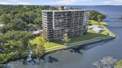 Gated high rise living on the St Johns River! Wake up to