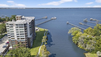 Gated high rise living on the St Johns River! Wake up to
