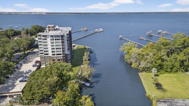 Gated high rise living on the St Johns River! Wake up to