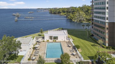 Gated high rise living on the St Johns River! Wake up to