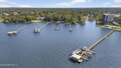Gated high rise living on the St Johns River! Wake up to