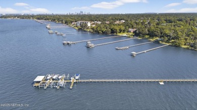 Gated high rise living on the St Johns River! Wake up to