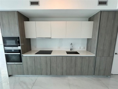 LOCATION, LOCATION, LOCATION. Beautiful 1 + den, 2 bath corner