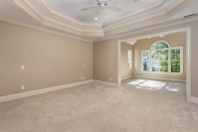 This stunning 4-bedroom, 4-bath home offers a refined living