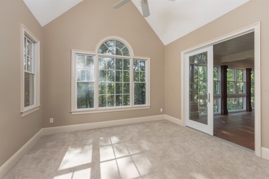 This stunning 4-bedroom, 4-bath home offers a refined living